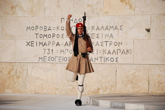 Athens, Greece / September 2023: The presidential palace guard in traditional Greek Tsolias outfit outside the Fallen Soldier monument at Syntagma square. 