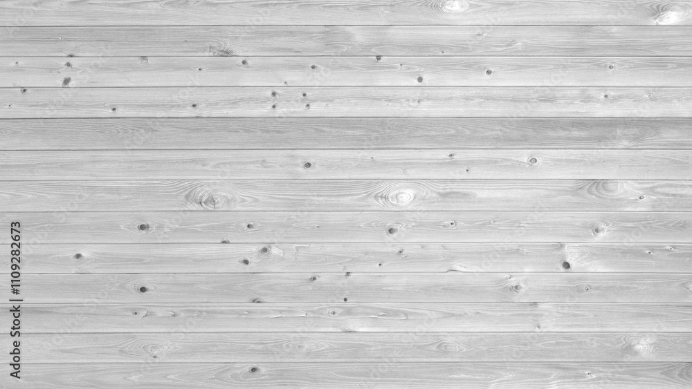 Aufkleber a white wooden surface with many holes. the surface is very smooth. there are no visible marks on th