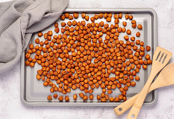 Food photography of roasted crispy chickpeas with  paprika, chili and herbs, plant protein, dietary fibre, healthy vegan food