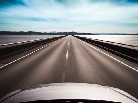 Personal perspective view of a car speeding along the Astoria-Megler Bridge across the Columbia River, Washington, USA