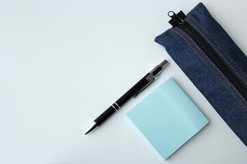 Blue stationery for student, school supplies for academic education. Pen, sticky notes and pencil...