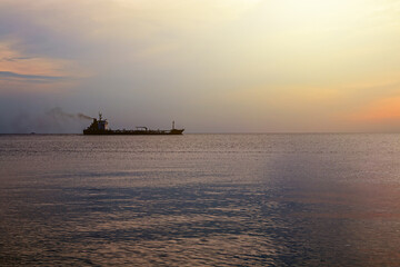 Silhouette of a ship in the sea