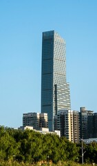 Fototapeta premium Modern skyscraper in urban cityscape.