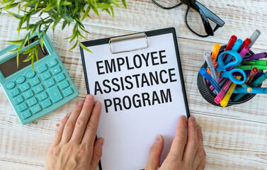word EAP Employee Assistance Program text on white paper on light background