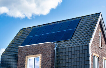 Fototapeta premium Solar Panel House Roof Generator Energy The Hague Netherlands Blue Sky Sun
