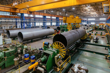 Steel pipe factory, working overhead crane