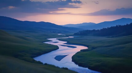 Serene sunset over a meandering river flowing through a vast valley landscape.