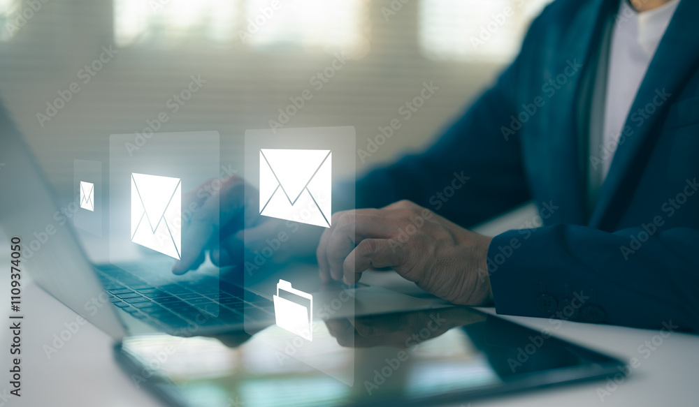 Poster hands of a businessman using laptop typing on keyboard computer and surfing internet on office table