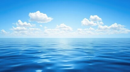 Blue sky with wispy clouds casting reflections on a calm ocean surface, peaceful and quiet