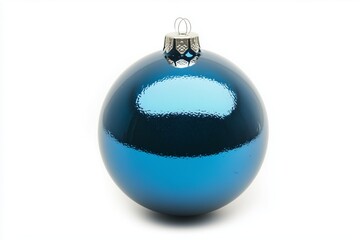 A blue Christmas tree ball is isolated on a white background. Christmas decoration. New Year and Christmas holidays. Photorealistic design. Close-up. Close-up