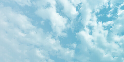 Obraz premium sunny sky blue light watercolor background. Aquarelle painting brush effect card paper textured canvas cloudy smoke space for text, entertaining card, template. aquamarine color graphics illustratio