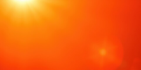 Obraz premium A Vibrant Orange Gradient Background With A Warm, Glowing Light Source In The Top Left Corner