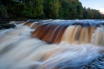 Long exposure close up of famous series of cascades in Yorkshire Dales