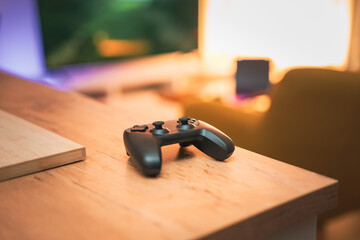 game pad wooden table living room © Jakub