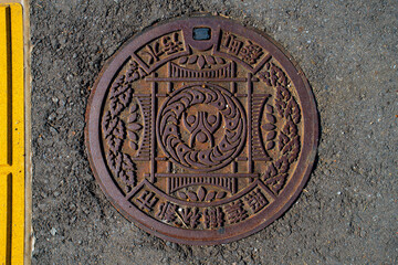 Miyazaki, Kyushu, Japan - November 18, 2024 - Manhole cover of Aya town in Miyazaki engraved with...