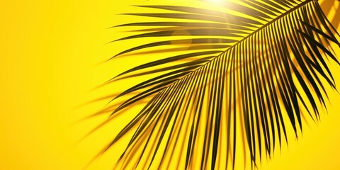 Obraz premium A Single Palm Leaf Casts a Shadow on a Vibrant Yellow Background, Creating a Striking Contrast of Light and Dark