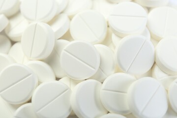 Pile of antibiotic pills as background, closeup
