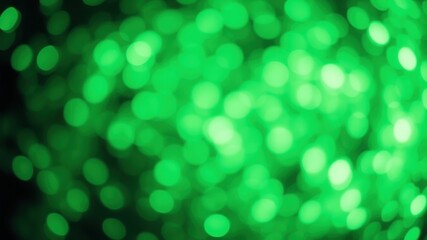 Obraz premium Abstract Green Bokeh Background with Circular Lights, Blurry and Out of Focus