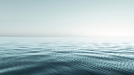 Obraz premium Tranquil Ocean Serenity, a peaceful coastal scene with gentle waves caressing the sandy beach beneath a bright blue sky, evoking a sense of calm and relaxation.