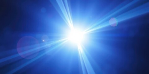 Fototapeta premium Abstract Light Rays Radiating from a Bright White Light Source in a Blue Background