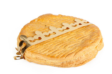 A traditional epiphany cake, French galette des rois with frangipane on a white background 