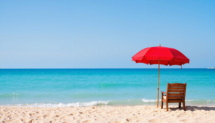 Red umbrella and chair on tropical beach
