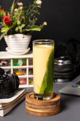 a glass of jelly drink and sweet corn juice