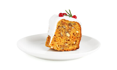Piece of traditional Christmas cake decorated with red currants and rosemary isolated on white
