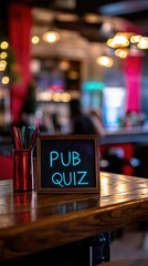 Bar table with chalkboard sign "PUB QUIZ"