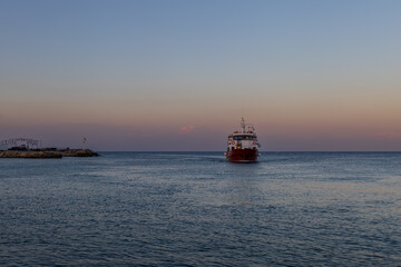 Fototapeta premium Seascape on the island of Rhodes. Boat on the sea surface