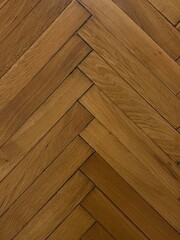 Fototapeta premium Herringbone pattern on a wood floor
