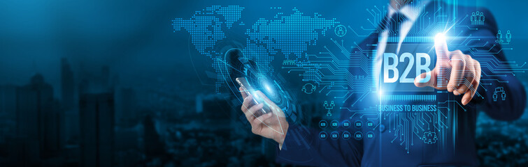 Businessman touch a circuit board B2B business-to-business digital transformation global network...