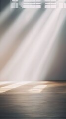 Obraz premium Soft Sunlight Streaming Through Windows, Casting Gentle Shadows on a Minimalist Wooden Floor in a Bright and Airy Empty Room