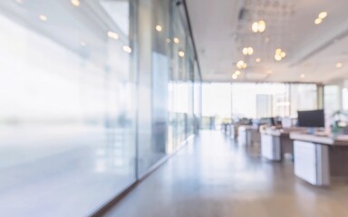 Obraz premium An empty, light-filled corridor in a modern office building with glass room seperators