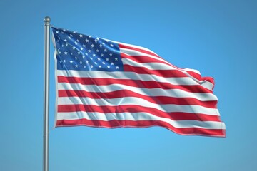 Fototapeta premium National waving flag of united states on pole against blue cloudless sky in daylight