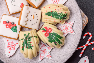 Sweet Madeleines desserts covered with chocolate in Christmas colors