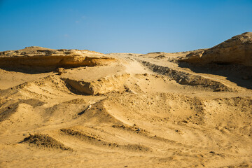 Yellow sand dunes in the desert Sahara in Egypt