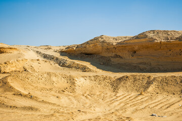 Yellow sand dunes in the desert Sahara in Egypt