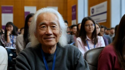 A diverse group of individuals engages in meaningful discussions while an elder shares wisdom at the event