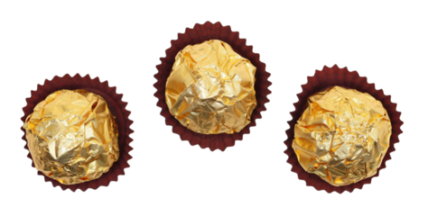 Chocolate balls in golden wrapping isolated on white, top view