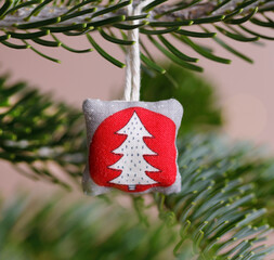 Handmade christmas ornament on a christmas tree