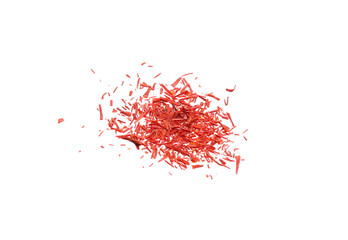 Dried saffron spice pieces isolated on a white background
