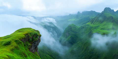 A stunning landscape showcases a vibrant green valley surrounded by mountains. Mist drifts through the peaks, creating a serene atmosphere during the early morning hours, perfect for nature lovers.