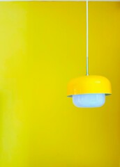 yellow wall and lamp