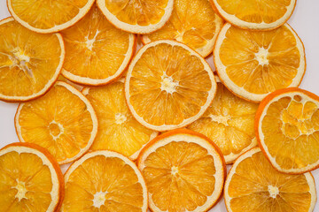Flat lay image of dried orange slices. 