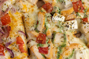 hot pizza with soft dough and cheese with ham and spices