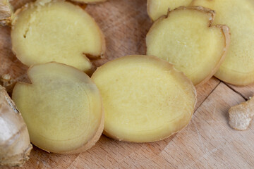 details of the ginger root used in cooking sliced into pieces