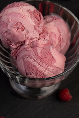raspberry cream ice cream with ripe raspberries and blackberries