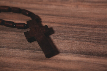 wooden cross on the table