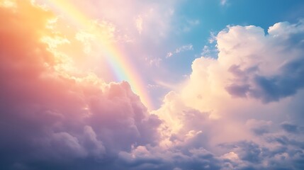 Obraz premium Vibrant rainbow arching through pastel cloudscape at sunset.